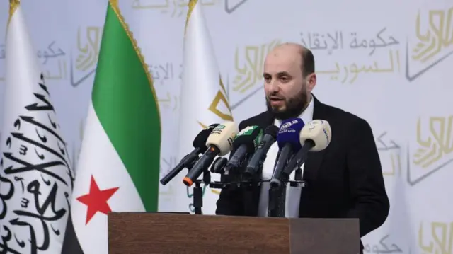 محمد البشير يقود الحكومة السورية المؤقتة 2024 عودة العمل في الدوائر الحكومية